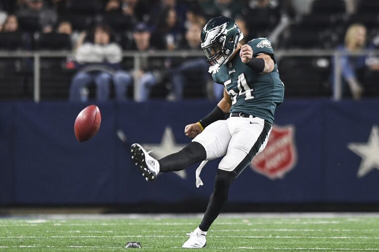 Eagles reserve linebacker Kamu Grugier-Hill kicks off during the Eagles 37-9 victory of the Dallas Cowboys in Dallas November 29, 2017. He was filling in for injured kicker Jake Elliott. CLEM MURRAY / Staff Photographer