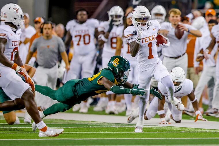 Texas' Xavier Worthy (1) returns a Baylor punt during the first half of an NCAA college football game Saturday, Sept. 23, 2023, in Waco, Texas. (AP Photo/Gareth Patterson)