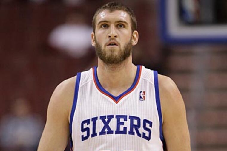 Spencer Hawes' overall play has been one of the big surprises for the Sixers so far. (Matt Slocum/AP)