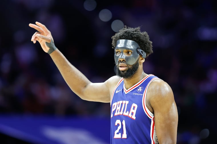 Sixers center Joel Embiid raises his fingers against the Miami Heat during game six of the second-round Eastern Conference playoffs on Thursday, May 12, 2022 in Philadelphia.