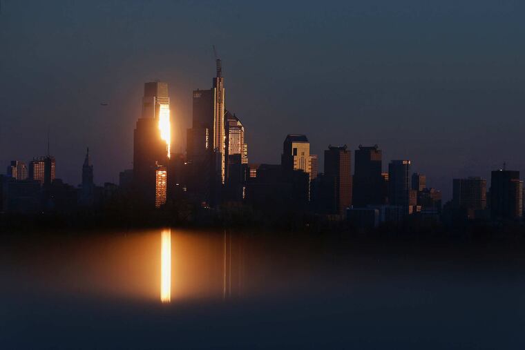 The Center City skyline as reflected on a car parked in West Fairmount Park in January 2018.
