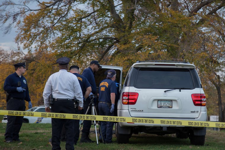 WANDA THOMAS / STAFF PHOTOGRAPHER Shakoor Arline and Lisa Smith were found shot to death Friday in this SUV in Fairmount Park.