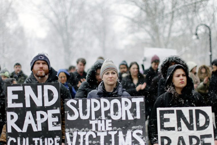 Students and others demonstrate on the Penn State campus Friday, March 20, 2015, in State College, Pa., in support of women police say were depicted on Kappa Delta Rho fraternity's private Facebook pages. (AP Photo/Matt Rourke)