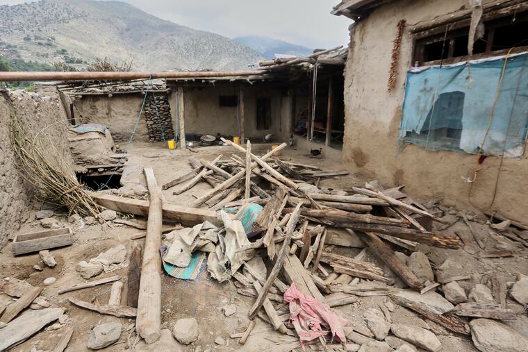 A partially collapsed house is seen in an area devastated by Sunday's powerful 6.0-magnitude earthquake that killed more 1,400 people and destroyed villages in eastern Afghanistan.