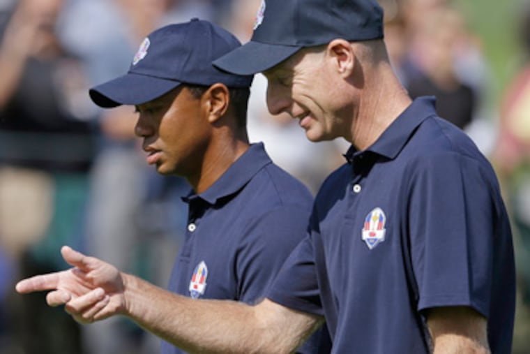 Tiger Woods, Phil Mickelson and Jim Furyk have been the core of the U.S. team since 1997. (Mark Lennihan/AP file)