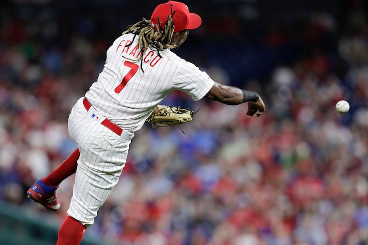 Third baseman Maikel Franco moves to throw Kurt Suzuki out at first in the seventh inning of the Phillies' 4-3 win Monday against Washington.