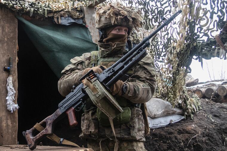 A Ukrainian soldier standing at the line of separation from pro-Russian rebels in the Donetsk region, Ukraine, on Jan. 10.