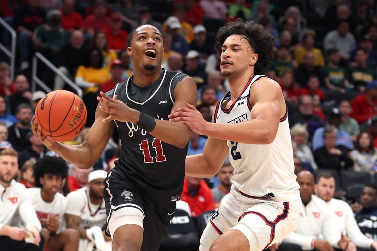 Xzayvier Brown (left) led St. Joseph's with a 17.6-point average this past season.
