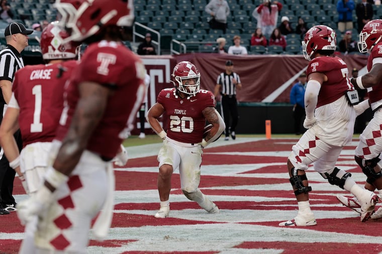 Temple’s Jay Ducker celebrates a touchdown against Navy.