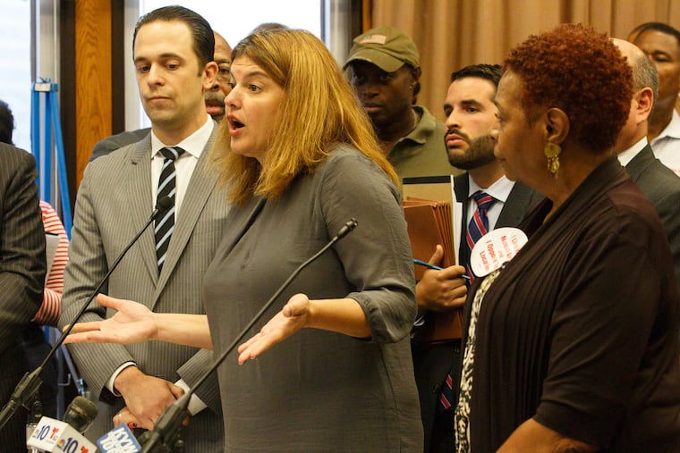 Christina Visco, president of the TerraVida Holistic Center, talks during a Zoning Board of Adjustment meeting about a proposed medical marijuana dispensary in East Mount Airy.