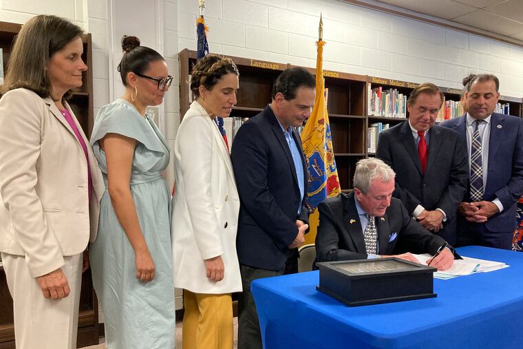 N.J. Democratic Gov. Phil Murphy signs the $50.6 billion fiscal year 2023 budget on Thursday.