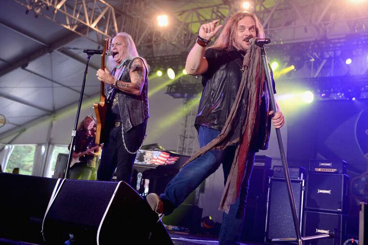 Lynyrd Skynyrd's Rickey Medlocke (left) and Johnny Van Zant. The band no longer performs with a Confederate flag, saying the symbol was "kidnapped" by the KKK.