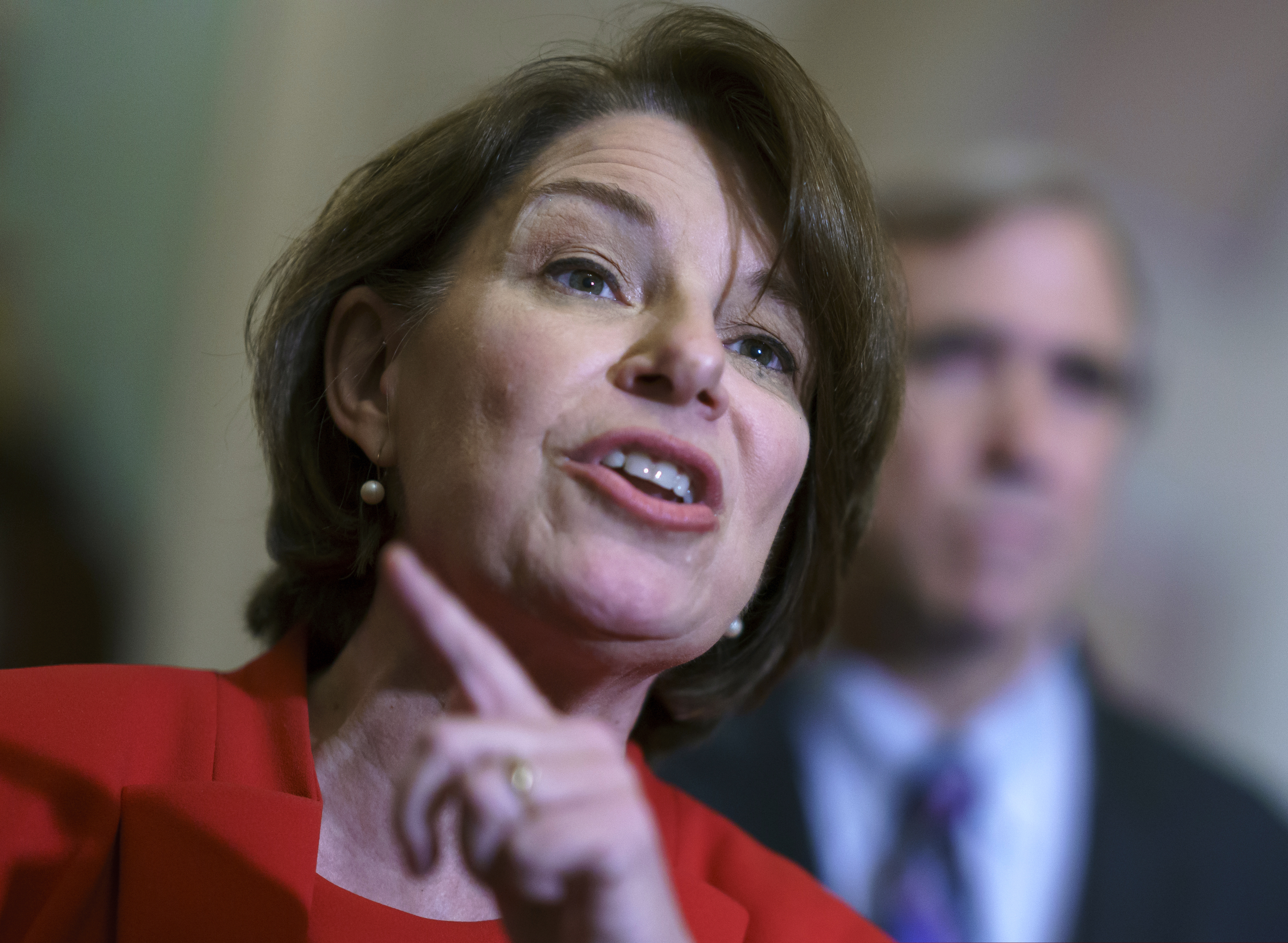 In this June 22 photo, Sen. Amy Klobuchar, D-Minn., talked with reporters at the Capitol in Washington.