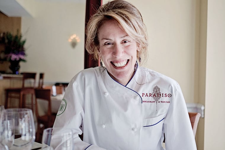 Lynn Rinaldi, chef and co-owner of Paradiso, at 1627 E. Passyunk Ave. ( ED HILLE / Staff Photographer )