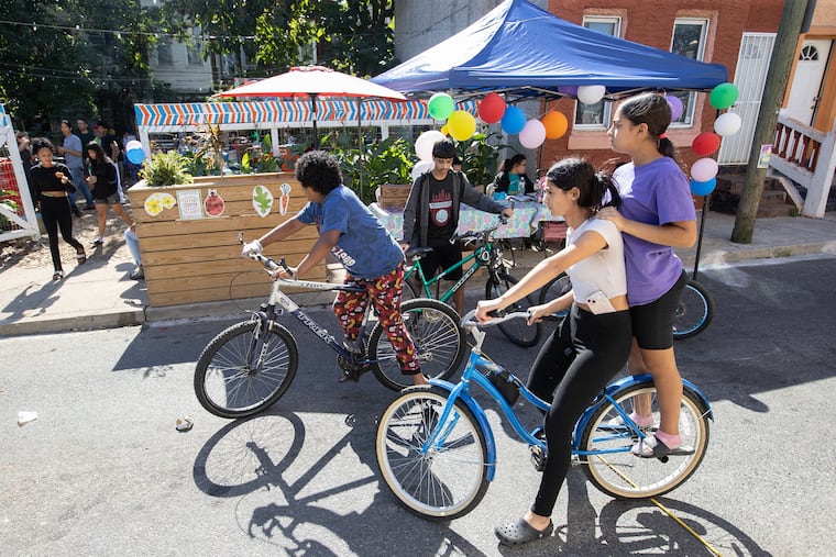 Youths arrive for the event at Hilton Street Garden, which focuses on keeping teenagers away from the drug culture. On Oct. 5, the garden hosted a community event.