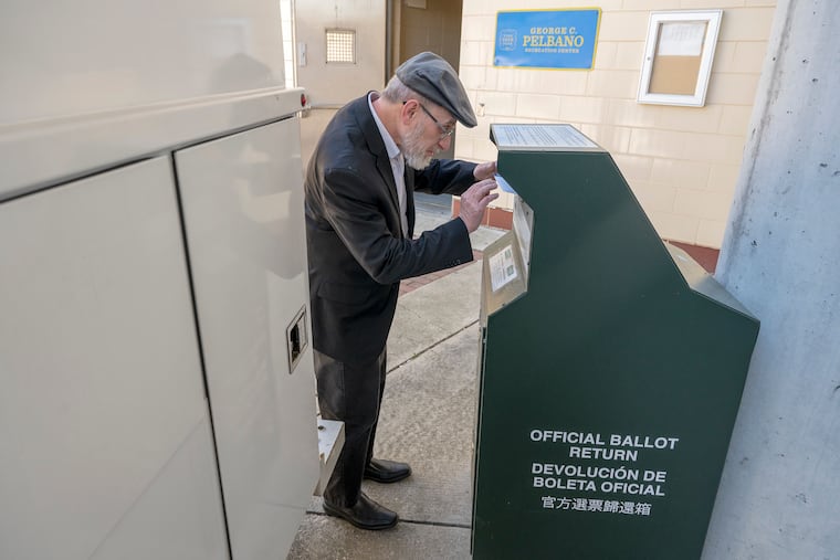 Abraham Meth returns his mail ballot at a drop box outside the Pelbano Recreation Center on Bustleton Avenue in Northeast Philadelphia on April 22, the day before the Pennsylvania primary.