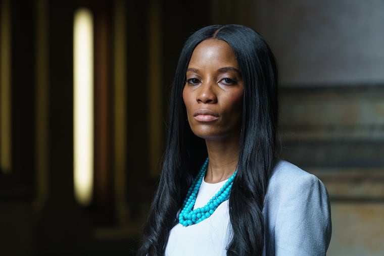 Laquisha Anthony of Women Organized Against Rape and V.O.I.C.E., shown here in the entranceway to Philadelphia City Hall, January 8, 2019. JESSICA GRIFFIN / Staff Photographer.