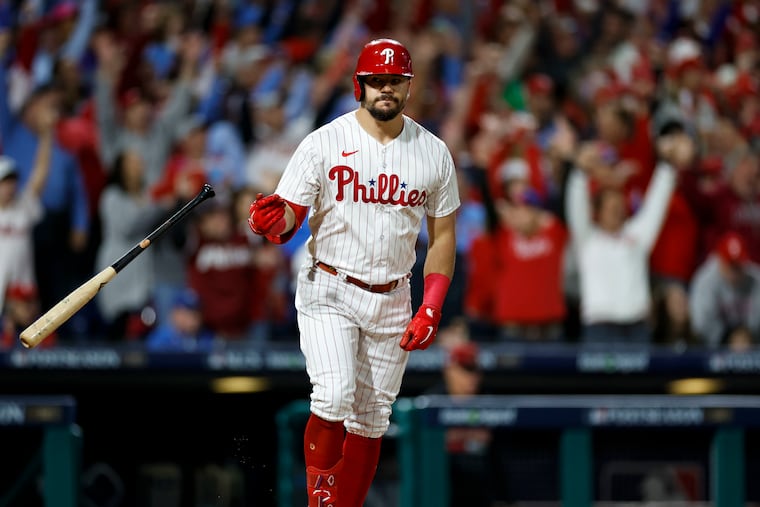 Kyle Schwarber flips his bat after bashing a home run on the first pitch he saw in the first inning.