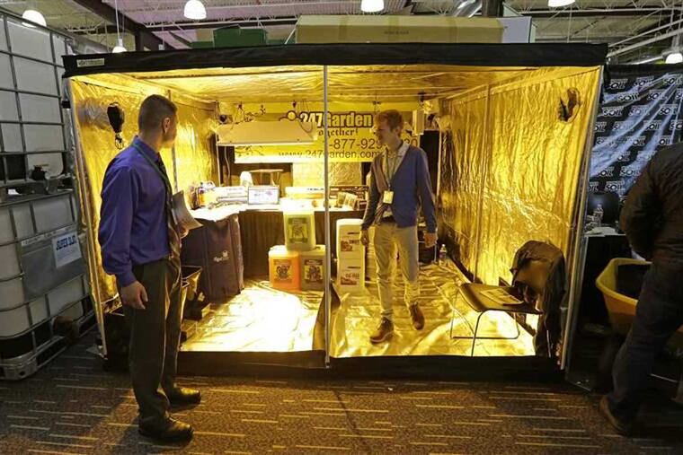 247Garden, a wholesale distributor of indoor garden and hydroponics growing supplies, exhibits a growing structure at a marijuana business trade show in Seattle. The Small Business Administration will no longer back loans to firms that derive any portion of their revenue from the cannabis industry, such as hydroponics makers that market to cannabis clients.