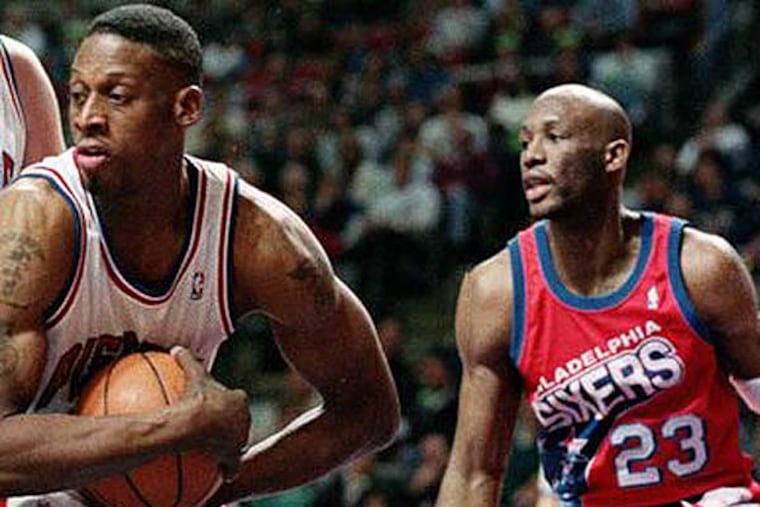 Tim Perry, who came to the Sixers in the Charles Barkley trade, sporting the ugly uniforms during a game in 1993. (Bill Waugh/AP file)