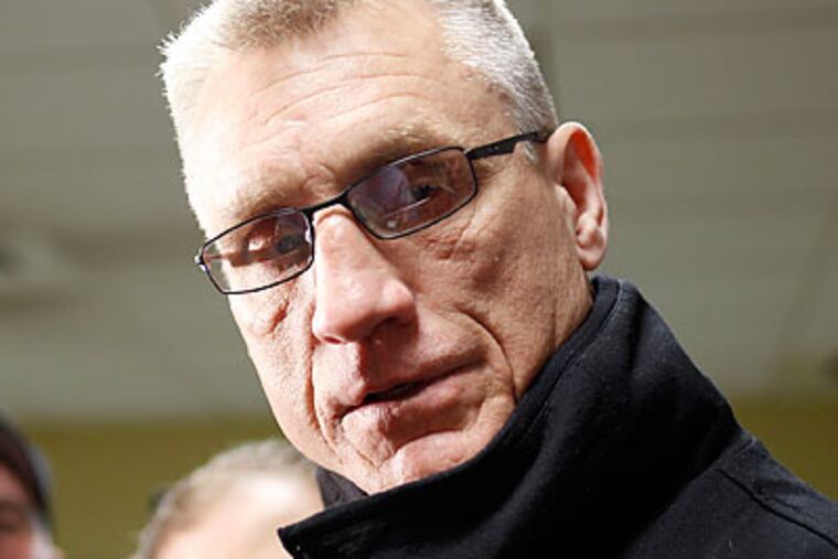 Paul Holmgren has made the Flyers bigger and younger - but no one knows if they got better. (Yong Kim/Staff file photo)