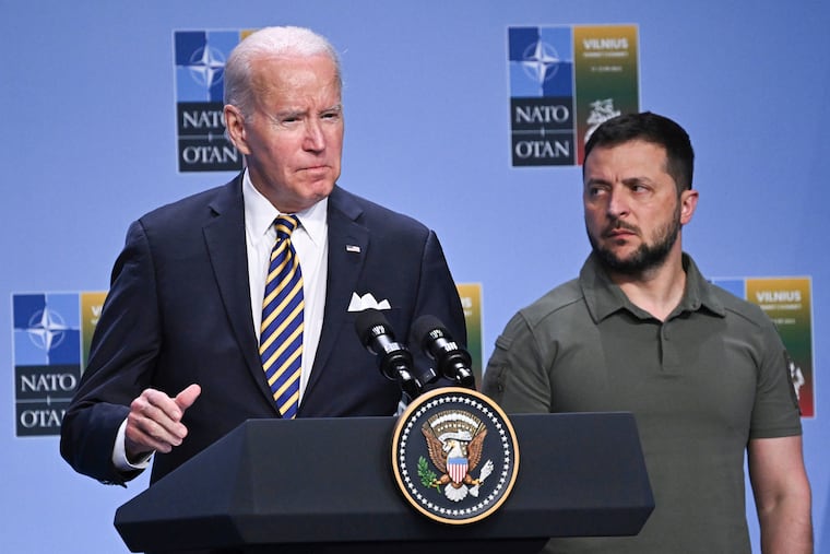 President Joe Biden speaks at an event with G7 leaders and Ukrainian President Volodymyr Zelensky during a 2023 NATO Summit, in Vilnius, Lithuania. Biden must act urgently and use his presidential authority to get aid to Kyiv, writes Trudy Rubin.