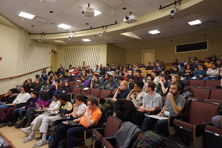 Students wait for the town hall discussion on Customs, the first-year experience program at Haverford College, to begin.