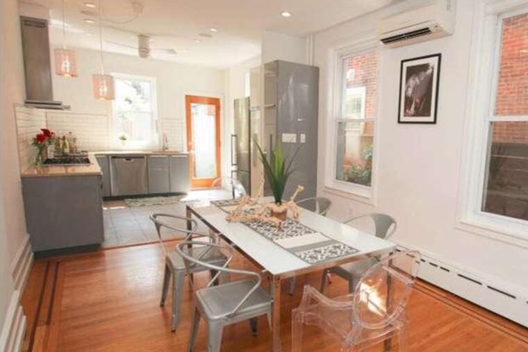 This three-bedroom, three-bathroom home offers a renovated kitchen, master bedroom, and outdoor patio space in Fairmount for $630,000. (Sergio Rojstaczer)