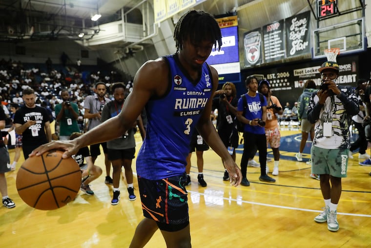 Team FOE guard Tyrese Maxey dribbles the basketball wearing his Rumph Classic jersey before the championship Rumph Classic game in the TruMark Financial Center at La Salle University on Monday.