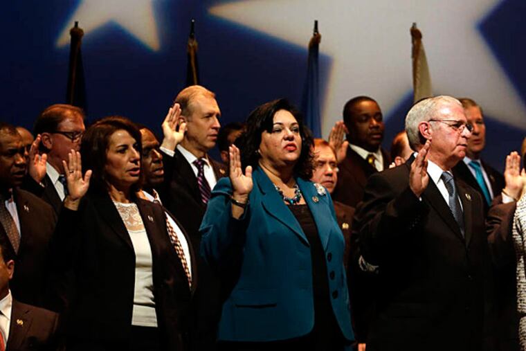 Lawmakers take the oath of office in Trenton. Members of both parties said cutting property taxes would be high on their list of priorities in the new session.