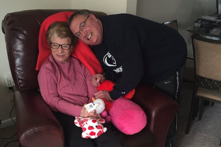 Paula Freid, shown with her brother, Randy Freid, choked to death last April at her group home on waffle that was not cut up into dime-sized pieces as a required by the care plan for the woman with intellectual disabilities.