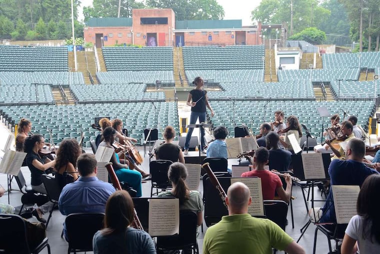 Music director Jeri Lynne Johnson leads the Black Pearl Chamber Orchestra in rehearsal at the Dell Music Center.