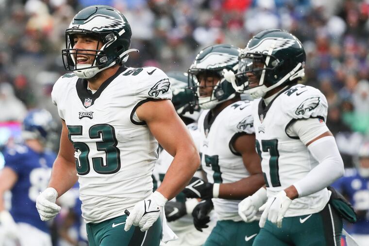 Philadelphia Eagles linebacker Christian Elliss (53) celebrates coming off the field during a game against the New York Giants at MetLife Stadium in East Rutherford, NJ on Sunday, Dec. 11, 2022.