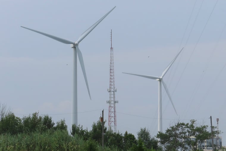 Land-based wind turbines spin in Atlantic City on July 20, 2023. Wind developer Orsted scrapped an offshore wind farm project in the Garden State citing supply chain problems and high interest rates.