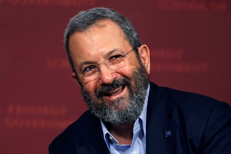 FILE - In this Sept. 21, 2016 file photo, former Israeli Prime Minister Ehud Barak smiles during a lecture at the John F. Kennedy School of Government at Harvard University in Cambridge, Mass. Barak announced Wednesday, June 26, 2019 that he is returning to politics and is forming a new party that will aim to unseat Prime Minister Benjamin Netanyahu in upcoming elections. Speaking at a Tel Aviv press conference, Barak called for an end to “Netanyahu’s rule with the radicals, racists and corrupt, with the Messianists and his corrupt leadership.” (AP Photo/Charles Krupa)