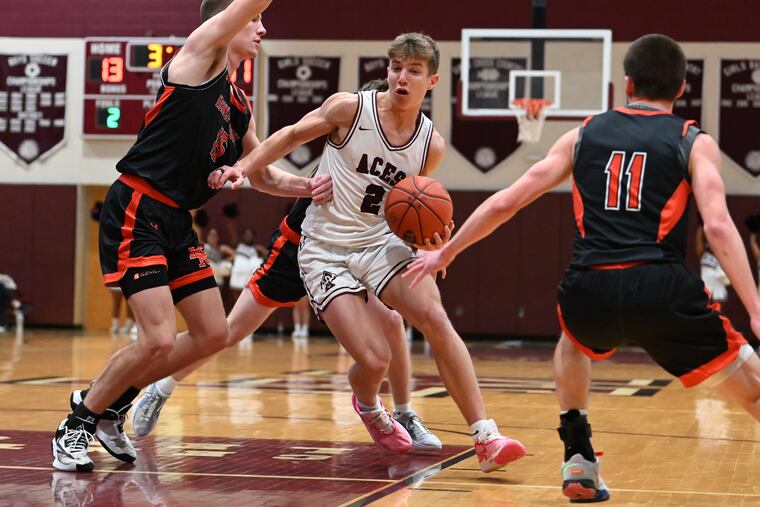 Lower Merion’s Adam Herrenkohl drives to the basket against Marple Newtown on Jan. 6.