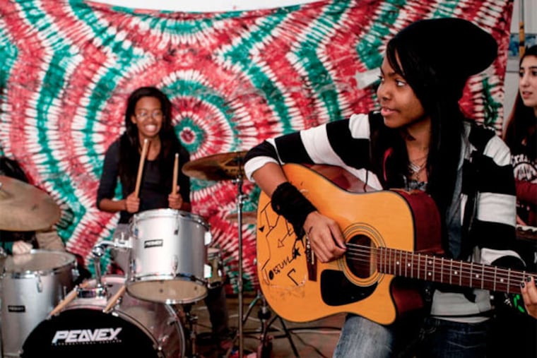 Lucid Dreamers , Nyree Jauhar on drums and Mecca Bonaparte on guitar, will play at Girls Rock Philly. Grace Winter Photography