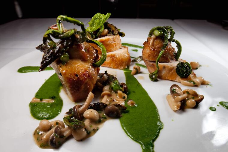 Stuffed breast of chicken, fennel seed sausage, speck, asparagus, honshimeji mushroom, as served at Farm and the Fisherman, April 18, 2012. ( David M Warren )