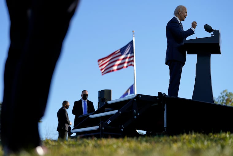 As U.S. Secret Service agents watch, Democratic presidential candidate former Vice President Joe Biden speaks at Gettysburg National Military Park in Gettysburg, Pa., Tuesday, Oct. 6, 2020.