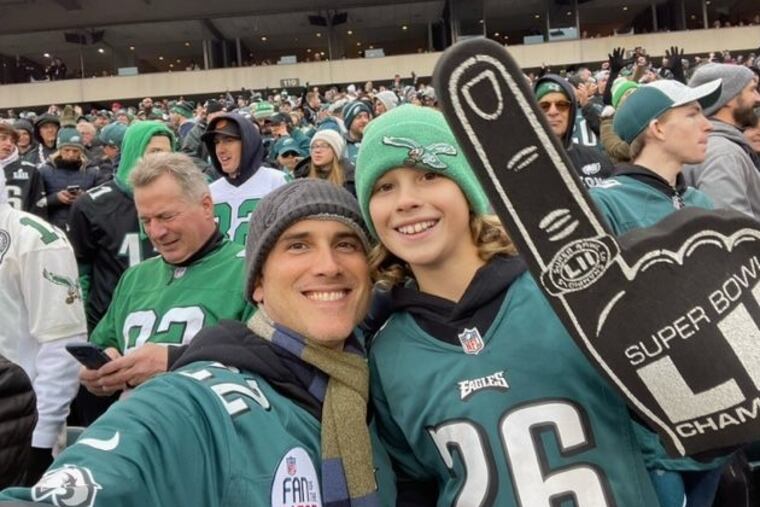 The author and his son at a recent Eagles game.