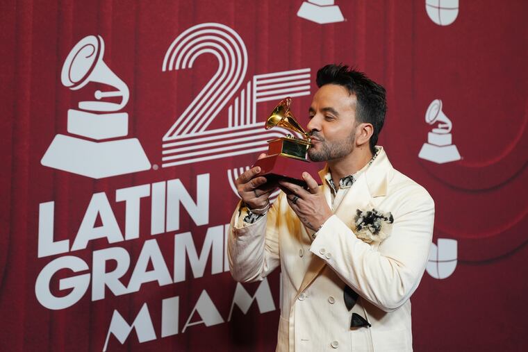 Luis Fonsi poses with the award for best pop vocal album at the 25th Latin Grammy Awards on Nov. 14, 2024, in Miami. (AP Photo/Rebecca Blackwell, File)