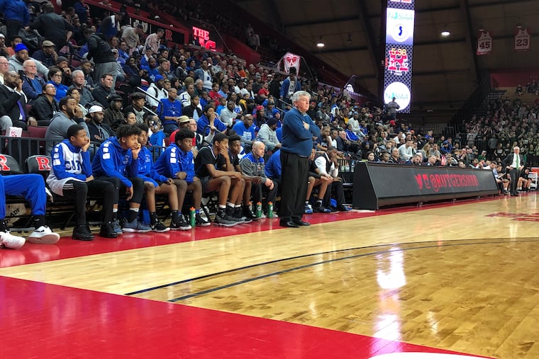 Dejection along bench for coach Paul Collins and Blue Devils as Burlington City loses in the Group 1 state final in boys' basketball.