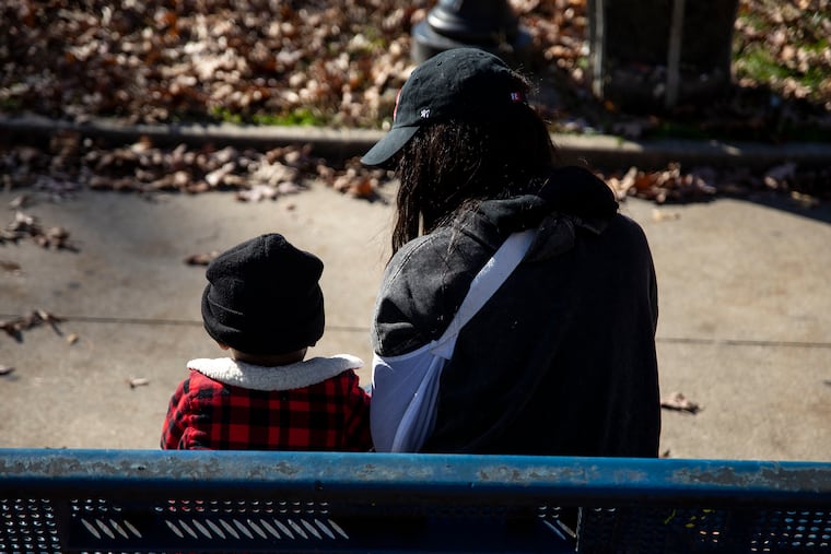Rickia Young, 28, of North Philadelphia, spends time with her son at Malcolm X Park on Friday, Nov. 20, 2020. Young was pulled out of her vehicle by police with force, along with her son and nephew in the car, in West Philadelphia during a night of protests.