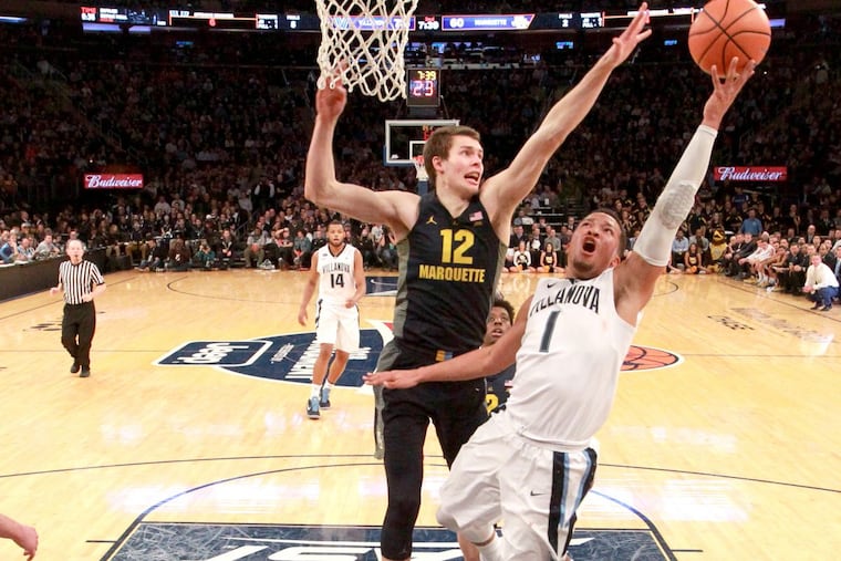 Jalen Brunson of Villanova takes the ball to the rim against Marquette in Big East quarterfinal game.