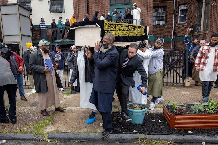 Pallbearers carry the body of Nicolas Elizalde from Philadelphia Masjid. Janazah Pray (funeral service) at Philadelphia Masjid, 4700 Wyalusing Ave., Philadelphia, for Nicolas Elizalde a 14-year-old killed after a high school football scrimmage at Roxborough High School. His funeral was held on Wednesday, October 5, 2022.