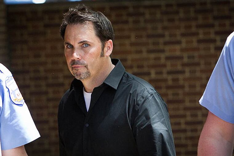 William Cheeseman owner of K&B Auto Body shop enters the Federal Courthouse with his attorney Fortunato Perri (not shown) on Thursday afternoon May 15, 2014. ( ALEJANDRO A. ALVAREZ / STAFF PHOTOGRAPHER )