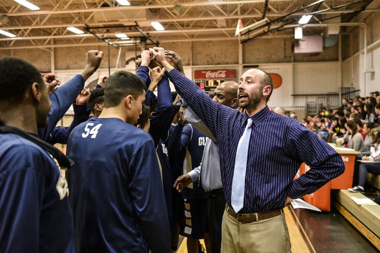 Clayton head coach Frank Rago speaks to his team.