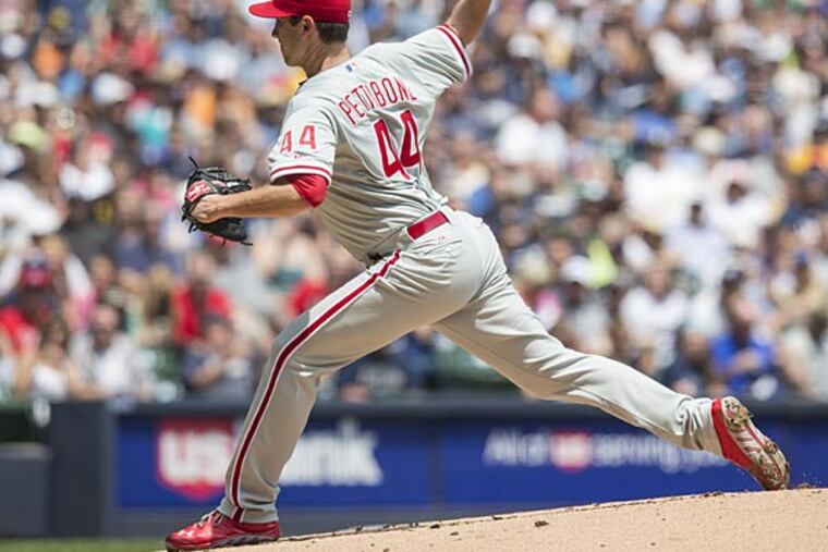 Phillies pitcher Jonathan Pettibone throws to a Brewers batter during the first inning on Sunday, June 9 in Milwaukee. (Tom Lynn/AP)