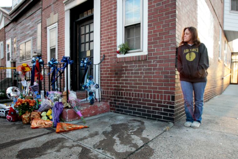 The crash "sounded like a bomb," said Patricia McDaniel, who lives next to this house at Allegheny and Aramingo Avenues. A makeshift memorial grew for Sgt. Timothy Simpson, honored just last week as supervisor of the year.