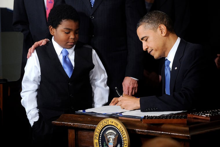 President Barack Obama signs the Affordable Care Act in the East Room of the White House in 2010. Since its inception, it was clear the ACA would need future adjustments, writes the Editorial Board. Unfortunately, Donald Trump has found it more beneficial politically to criticize rather than improve Obamacare.